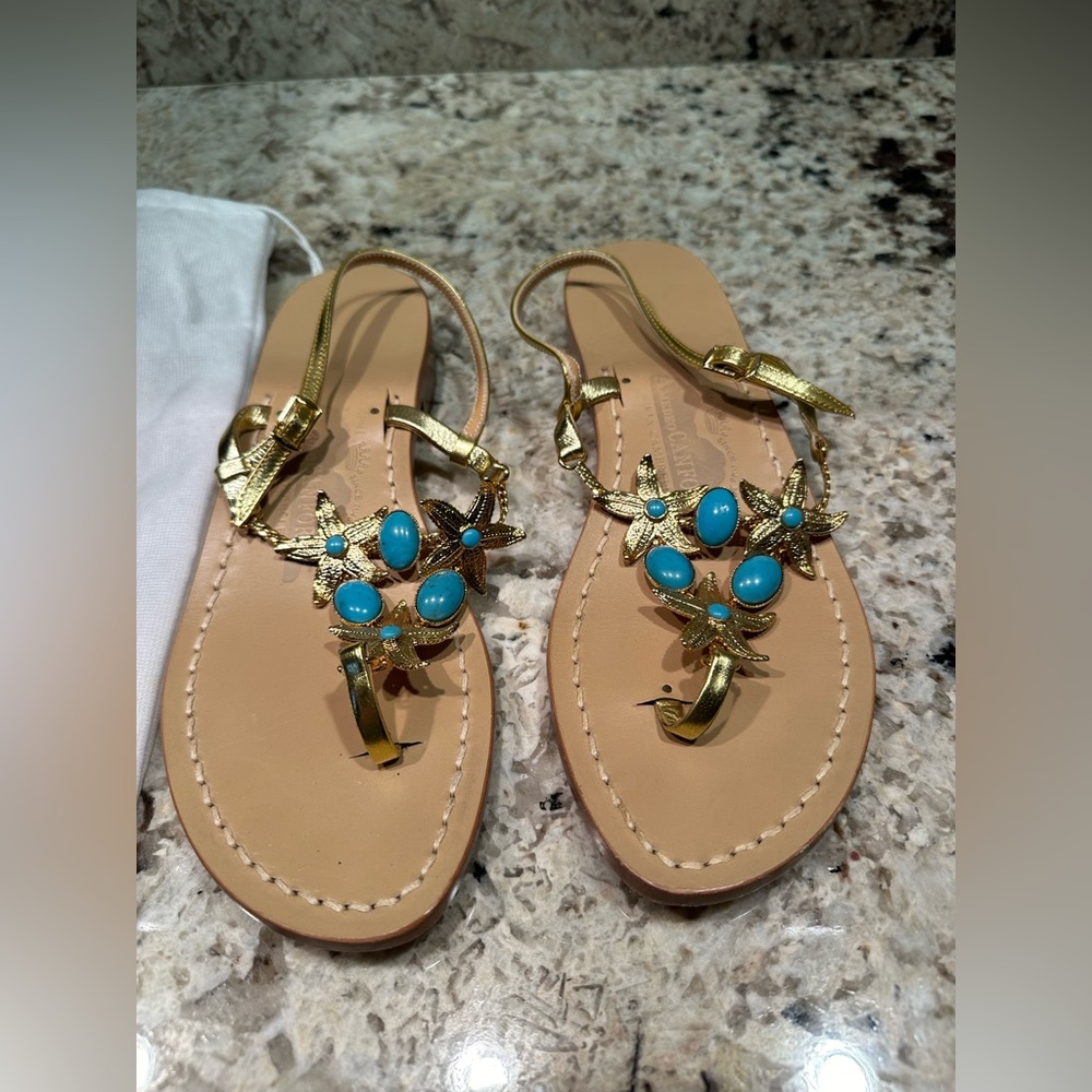 Amedeo Canfora starfish and turquoise embellishment in gold tone.  Size 9